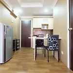 Relaxing 2BR with Pool View Mutiara Bekasi Apartment By Travelio
