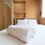 Relaxing 2BR with Pool View Mutiara Bekasi Apartment By Travelio